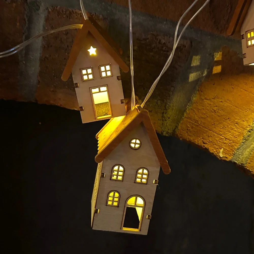 2 sets of tiny House garland with battery operated lights inside. 10 ft cord.